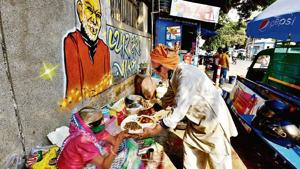 Kanta Prasad and Badami Devi next to their dhaba in Malviya Nagar.(PTI) Kanta Prasad and Badami Devi next to their dhaba in Malviya Nagar.(PTI)