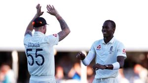 England's Jofra Archer celebrates with teammate Ben Stokes after taking the wicket of Australia's Nathan Lyon.(Action Images via Reuters) England's Jofra Archer celebrates with teammate Ben Stokes after taking the wicket of Australia's Nathan Lyon.(Action Images via Reuters)