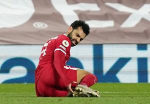 Liverpool's Mohamed Salah goes down in the area after a challenge by West Ham United's Arthur Masuaku resulting in a penalty to Liverpool.(Pool via REUTERS) Liverpool's Mohamed Salah goes down in the area after a challenge by West Ham United's Arthur Masuaku resulting in a penalty to Liverpool.(Pool via REUTERS)