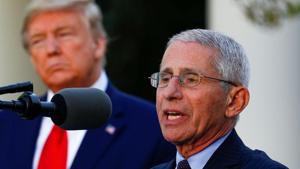 FILE PHOTO: Dr. Anthony Fauci, director of the National Institute of Allergy and Infectious Diseases, addresses the daily coronavirus response briefing as US President Donald Trump stands by in the Rose Garden at the White House in Washington,on March 30, 2020 (REUTERS/Tom Brenner) FILE PHOTO: Dr. Anthony Fauci, director of the National Institute of Allergy and Infectious Diseases, addresses the daily coronavirus response briefing as US President Donald Trump stands by in the Rose Garden at the White House in Washington,on March 30, 2020 (REUTERS/Tom Brenner)
