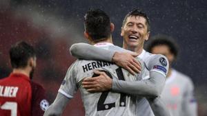 Bayern Munich’s scorer Lucas Hernandez, left, celebrates with Robert Lewandowski.(AP) Bayern Munich’s scorer Lucas Hernandez, left, celebrates with Robert Lewandowski.(AP)