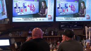 People watch US election results on November 3 in Janesville, Wisconsin.(AFP) People watch US election results on November 3 in Janesville, Wisconsin.(AFP)