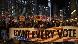 Some demonstrators smashed storefront, windows in the downtown areas as the police labelled the incident a riot and swarmed in.(AP Photo) Some demonstrators smashed storefront, windows in the downtown areas as the police labelled the incident a riot and swarmed in.(AP Photo)