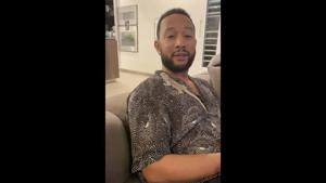 The image shows John Legend and a bearded dragon.(Twitter/@chrissyteigen) The image shows John Legend and a bearded dragon.(Twitter/@chrissyteigen)