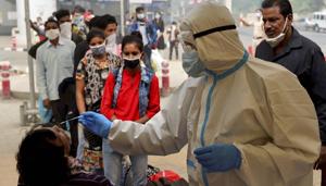 A health worker conducts Covid-19 RAT test at Anand Vihar Bus Terminal, as coronavirus cases surge across the national capital, in New Delhi.(PTI) A health worker conducts Covid-19 RAT test at Anand Vihar Bus Terminal, as coronavirus cases surge across the national capital, in New Delhi.(PTI)