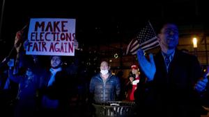 Supporters of US President Donald Trump protest outside the Central Counting Board hall Thursday, Nov. 5, 2020, in Detroit. (Nicole Hester/Ann Arbor News via AP) Supporters of US President Donald Trump protest outside the Central Counting Board hall Thursday, Nov. 5, 2020, in Detroit. (Nicole Hester/Ann Arbor News via AP)