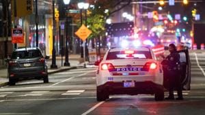 Philadelphia Police officer stands guard near Pennsylvania Convention Center after probing alleged plot to attack vote counting venue.(Reuters) Philadelphia Police officer stands guard near Pennsylvania Convention Center after probing alleged plot to attack vote counting venue.(Reuters)