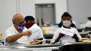 The Trump campaign had sought to halt the counting of mail ballots in the county, saying observers were being kept too far away to be able to see if signatures matched voter registration records(AFP) The Trump campaign had sought to halt the counting of mail ballots in the county, saying observers were being kept too far away to be able to see if signatures matched voter registration records(AFP)