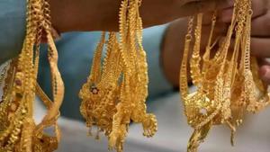 A sales person shows gold ornaments at a jewellery shop, on the occasion of ‘Akshaya Tritiya’, in Chennai,(PTI File Photo) A sales person shows gold ornaments at a jewellery shop, on the occasion of ‘Akshaya Tritiya’, in Chennai,(PTI File Photo)