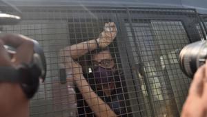 Republic TV editor-in-chief Arnab Goswami in police van at Alibag court, Alibag police picked up Goswami from his Mumbai residence in Alibag on Wednesday.(Satish Bate/HT Photo) Republic TV editor-in-chief Arnab Goswami in police van at Alibag court, Alibag police picked up Goswami from his Mumbai residence in Alibag on Wednesday.(Satish Bate/HT Photo)