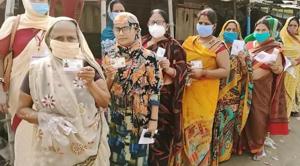 Saharsa, India – November 7, 2020: Voters in a queue to cast vote in the third phase of Bihar Assembly election, in Saharsa, Bihar, India on Saturday, November 07, 2020. (HT Photo) Saharsa, India – November 7, 2020: Voters in a queue to cast vote in the third phase of Bihar Assembly election, in Saharsa, Bihar, India on Saturday, November 07, 2020. (HT Photo)