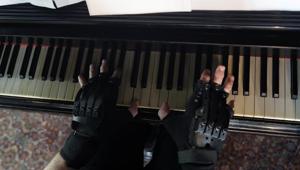 The pianist, who lost the ability to play due to health complications, plays piano again.(REUTERS) The pianist, who lost the ability to play due to health complications, plays piano again.(REUTERS)