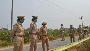 Police personnel stand guard as CBI officials (unseen) investigate the case of a 19-year-old Dalit woman who died after being gang-raped, in Hathras, Tuesday, Oct. 13, 2020.(PTI) Police personnel stand guard as CBI officials (unseen) investigate the case of a 19-year-old Dalit woman who died after being gang-raped, in Hathras, Tuesday, Oct. 13, 2020.(PTI)