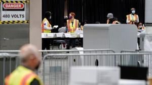 Electoral workers count postal ballots following the 2020 US Presidential election, in Philadelphia, Pennsylvania.(Reuters) Electoral workers count postal ballots following the 2020 US Presidential election, in Philadelphia, Pennsylvania.(Reuters)