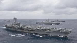 The aircraft carrier USS Nimitz (CVN 68)as it leads a formation of ships from the Indian navy, Japan Maritime Self-Defense Force (JMSDF) and the US Navy in the Bay of Bengal as part of Exercise Malabar 2017.(AFP) The aircraft carrier USS Nimitz (CVN 68)as it leads a formation of ships from the Indian navy, Japan Maritime Self-Defense Force (JMSDF) and the US Navy in the Bay of Bengal as part of Exercise Malabar 2017.(AFP)