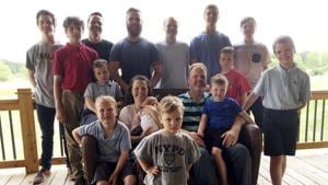 The Schwandt family poses for a photo at their farm in Lakeview, Mich. Standing from left are Tommy, Calvin, Drew, Tyler, Zach, Brandon, Gabe, Vinny and Wesley. Seated, starting at upper left are Charlie, Luke, mother Kateri holding Finley, father Jay with Tucker and Francisco in the foreground. The 14-boy family has welcomed their first daughter nearly three decades after the birth of their first child. Kateri Schwandt gave birth to Maggie Jayne Schwandt.(AP) The Schwandt family poses for a photo at their farm in Lakeview, Mich. Standing from left are Tommy, Calvin, Drew, Tyler, Zach, Brandon, Gabe, Vinny and Wesley. Seated, starting at upper left are Charlie, Luke, mother Kateri holding Finley, father Jay with Tucker and Francisco in the foreground. The 14-boy family has welcomed their first daughter nearly three decades after the birth of their first child. Kateri Schwandt gave birth to Maggie Jayne Schwandt.(AP)