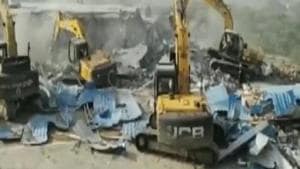 The demolition work as seen at Computer Baba’s Indore ashram. (Videograb) The demolition work as seen at Computer Baba’s Indore ashram. (Videograb)