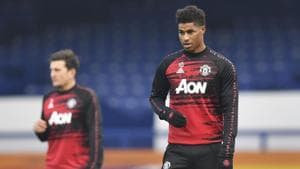 Manchester United's Marcus Rashford warms up ahead of the English Premier League soccer match between Everton and Manchester United at the Goodison Park stadium in Liverpool.(AP)