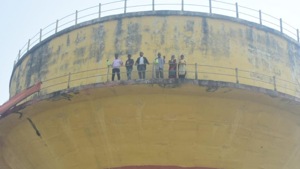 The lawyer and his family atop the water tank.(HT PHOTO) The lawyer and his family atop the water tank.(HT PHOTO)
