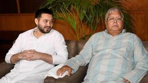RJD chief Lalu Prasad and his son Tejashwi Prasad Yadav.(PTI file photo) RJD chief Lalu Prasad and his son Tejashwi Prasad Yadav.(PTI file photo)