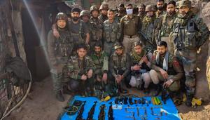 Security personnel after recovering arms and ammunition in Kirni area of Poonch district on November 9.(PTI) Security personnel after recovering arms and ammunition in Kirni area of Poonch district on November 9.(PTI)
