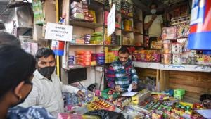 People buy firecrackers from a shop ahead of Diwali at Sadar Bazar, in New Delhi on November 3.(Amal KS/HT PHOTO) People buy firecrackers from a shop ahead of Diwali at Sadar Bazar, in New Delhi on November 3.(Amal KS/HT PHOTO)