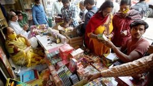 New Delhi: People visit a firecrackers' shop, ahead of Diwali, near Jama Masjid in old Delhi, Friday, Nov. 6, 2020 (PTI Photo/Kamal Singh) New Delhi: People visit a firecrackers' shop, ahead of Diwali, near Jama Masjid in old Delhi, Friday, Nov. 6, 2020 (PTI Photo/Kamal Singh)