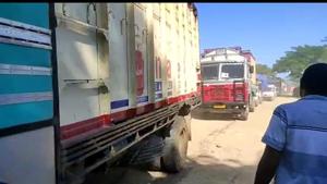 Trucks moving from Lailapur in Assam to Mizoram on Monday.(HT PHOTO)