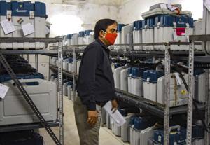 An election official checks Electronic Voting Machines (EVMs).(PTI) An election official checks Electronic Voting Machines (EVMs).(PTI)