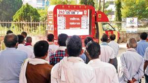 People watching exit polls of the Bihar Assembly election, in Patna on Tuesday. (ANI Photo) People watching exit polls of the Bihar Assembly election, in Patna on Tuesday. (ANI Photo)