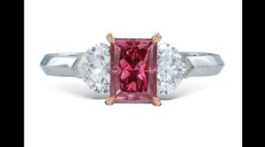 The stone is mounted on a platinum and gold ring flanked by two heart-shaped diamonds.(www.christies.com) The stone is mounted on a platinum and gold ring flanked by two heart-shaped diamonds.(www.christies.com)