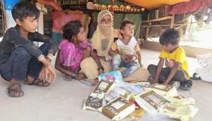 A family with a Diwali happiness kit.(HT PHOTO) A family with a Diwali happiness kit.(HT PHOTO)