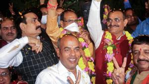 Madhya Pradesh chief minister Shivraj Singh Chouhan and BJP state president VD Sharma celebrate the party's victory in Madhya Pradesh Assembly by-elections, at BJP State headquarters in Bhopal.(PTI) Madhya Pradesh chief minister Shivraj Singh Chouhan and BJP state president VD Sharma celebrate the party's victory in Madhya Pradesh Assembly by-elections, at BJP State headquarters in Bhopal.(PTI)