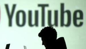 FILE PHOTO: Silhouettes of mobile device users are seen next to a screen projection of Youtube logo.(Reuters File Photo) FILE PHOTO: Silhouettes of mobile device users are seen next to a screen projection of Youtube logo.(Reuters File Photo)
