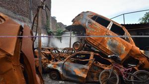 Damaged vehicles which were set fire during the Delhi riots seen dumped inside a parking lot six months after the North-East Delhi riots, at Shiv Vihar, in New Delhi.(Sanchit Khanna/HT PHOTO) Damaged vehicles which were set fire during the Delhi riots seen dumped inside a parking lot six months after the North-East Delhi riots, at Shiv Vihar, in New Delhi.(Sanchit Khanna/HT PHOTO)