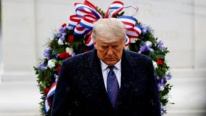 US President Donald Trump as he attends a Veterans Day observance in Arlington National Cemetery in Arlington, Virginia, US.(Reuters) US President Donald Trump as he attends a Veterans Day observance in Arlington National Cemetery in Arlington, Virginia, US.(Reuters)