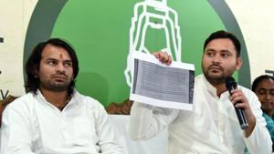 RJD leader Tejashwi Yadav along with his brother and party leader Tej Pratap Yadav during a press conference in Patna on Thursday.(ANI) RJD leader Tejashwi Yadav along with his brother and party leader Tej Pratap Yadav during a press conference in Patna on Thursday.(ANI)