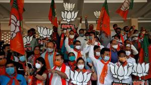 Supporters of India's ruling Bharatiya Janata Party (BJP) hold their party symbols and flags in Gandhinagar.(Reuters/ Representative image) Supporters of India's ruling Bharatiya Janata Party (BJP) hold their party symbols and flags in Gandhinagar.(Reuters/ Representative image)