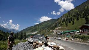 India's Border Security Force (BSF) soldiers stand guard at a checkpoint along a highway leading to Ladakh. “10-12 Pakistan Army soldiers injured in the Indian Army firing in which a large number of Pakistan Army bunkers, fuel dumps, and launch pads have also been destroyed,” officials said.(REUTERS) India's Border Security Force (BSF) soldiers stand guard at a checkpoint along a highway leading to Ladakh. “10-12 Pakistan Army soldiers injured in the Indian Army firing in which a large number of Pakistan Army bunkers, fuel dumps, and launch pads have also been destroyed,” officials said.(REUTERS)