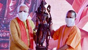 Prime Minister Narendra Modi being presented with a memento by Uttar Pradesh Chief Minister Yogi Adityanath during the foundation stone laying ceremony of Ram Temple, in Ayodhya.(PTI) Prime Minister Narendra Modi being presented with a memento by Uttar Pradesh Chief Minister Yogi Adityanath during the foundation stone laying ceremony of Ram Temple, in Ayodhya.(PTI)