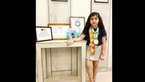 The image shows 7-year-old Abhijita Gupta who has been recognized as the world’s youngest author by the International Book of Records.(ANI) The image shows 7-year-old Abhijita Gupta who has been recognized as the world’s youngest author by the International Book of Records.(ANI)