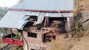 A house damaged in Pakistani shelling in Naugam Sector in Kashmir on Friday(ANI) A house damaged in Pakistani shelling in Naugam Sector in Kashmir on Friday(ANI)