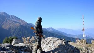 Indian Army soldier stands guard near Nastachun pass, also known as Sadhana pass, about 8 Km from the Line of Control (LOC) in Kupwara.(AFP) Indian Army soldier stands guard near Nastachun pass, also known as Sadhana pass, about 8 Km from the Line of Control (LOC) in Kupwara.(AFP)