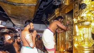 Priests perform rituals at the Sabarimala temple in Pathanamthitta district of Kerala.(PTI Photo) Priests perform rituals at the Sabarimala temple in Pathanamthitta district of Kerala.(PTI Photo)