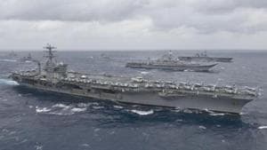 US aircraft carrier USS Nimitz will participate in the naval drills with Indian aircraft carrier Vikramaditya along with aircraft carriers from Australia and Japan in the high intensity naval operations over four days.(AFP Photo/File) US aircraft carrier USS Nimitz will participate in the naval drills with Indian aircraft carrier Vikramaditya along with aircraft carriers from Australia and Japan in the high intensity naval operations over four days.(AFP Photo/File)