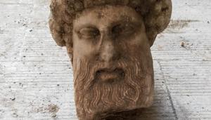In this undated photo, provided by the Greek Culture Ministry on Sunday, Nov. 15, 2020, a head of the ancient god Hermes is pictured after being found during sewage works in central Athens. The ministry said Sunday that the head, depicting Hermes at a "mature age", one of many that served as street markers in ancient Athens, appears to be from around 300 BC, that is, either from the late 4th century BC, or the early 3rd century.(AP) In this undated photo, provided by the Greek Culture Ministry on Sunday, Nov. 15, 2020, a head of the ancient god Hermes is pictured after being found during sewage works in central Athens. The ministry said Sunday that the head, depicting Hermes at a "mature age", one of many that served as street markers in ancient Athens, appears to be from around 300 BC, that is, either from the late 4th century BC, or the early 3rd century.(AP)