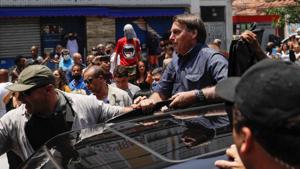 Bolsonaro, who is currently not affiliated with any political party, had said he would not get involved in the election campaign, but in recent weeks he turned to social media to promote a dozen candidates for mayor as well as councillor candidates.(Reuters Photo) Bolsonaro, who is currently not affiliated with any political party, had said he would not get involved in the election campaign, but in recent weeks he turned to social media to promote a dozen candidates for mayor as well as councillor candidates.(Reuters Photo)