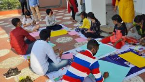 Children taking part in a poster-making initiative during their stay in Guwahati to prepare a manifesto.(Utpal Parashar/HT PHOTO) Children taking part in a poster-making initiative during their stay in Guwahati to prepare a manifesto.(Utpal Parashar/HT PHOTO)
