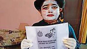 A student taking part in a role-playing activity during online Children’s Day celebrations. A student taking part in a role-playing activity during online Children’s Day celebrations.