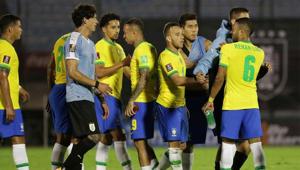 Players shake hands after the match between Brazil and Uruguay.(Reuters) Players shake hands after the match between Brazil and Uruguay.(Reuters)